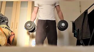 bulky stud doing exercises at home nude