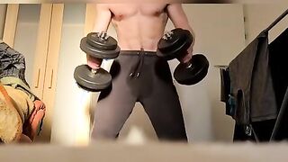 bulky stud doing exercises at home nude