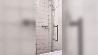 bulky bodybuilder trim hair during douche