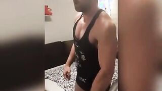 beefy bodybuilder is doing exercsises nude