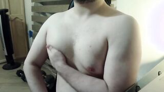 Bulky pec flexing sesh on webcam
