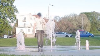 Ambling with clothes on thru a flow and get entirely drenched