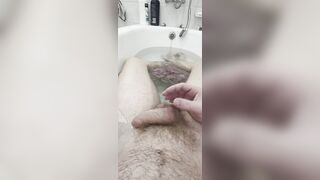 Perceives superb lounging in the bathtub and toying