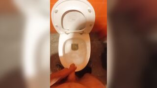 Peeing in a public TOILET