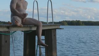 Spunking on a pier for everyone to watch