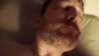 Guy jerks and shoots some jizm on his face