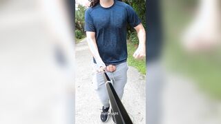 Freeballing in gray sweatpants outdoors manhood out in slow-movability