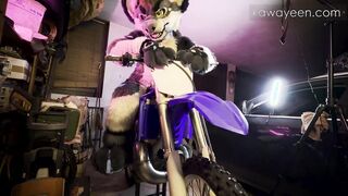 Hyena fursuiter porks inflatable plaything on his dirtbike