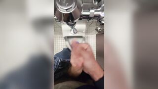 Uncircumcised nubile wanks off in public douche urinal before solo wordy jizz shot with bellowing