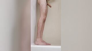 Youngster displays off caboose, soles, gams, and assets in the douche before jizzing solo petting