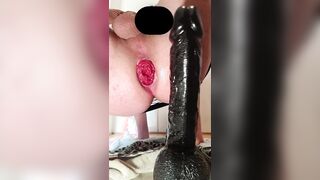 Femboy in a sundress having some joy with a massager and a faux-cock