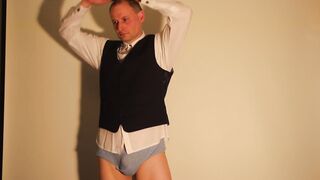 Kudoslong in a tee-shirt and waistcoat peels off and masturbates his smoothly-shaven uncircumcised manmeat