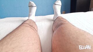 School guy fondles his soles, taking off his lengthy, perspiring socks