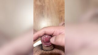 Uncircumcised trunk pulls flesh all the way down and fondles head to spunk real rapid