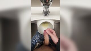 Milking, peeing, jizzing. School uncircumcised boy plays with foreskin in public urinal