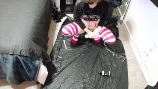 plugged and encaged femboy blows a load