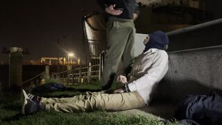 2 masculine guys, they dont know each other, urinating in a public place to greet each other.