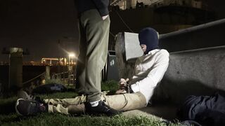 2 masculine guys, they dont know each other, urinating in a public place to greet each other.