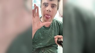 Man in a sweatshirt milks off, ejaculates in the douche, munches up the man gravy.