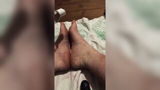 Caressing my soles with lubricant
