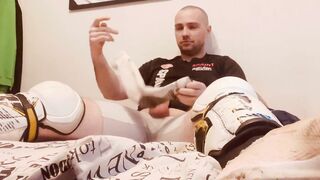 Jack in Hockey shinpads Soccer cleats and Hockey mittens