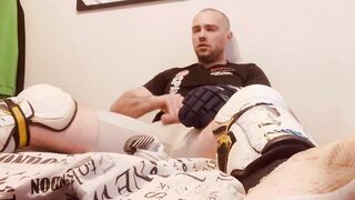 Jack in Hockey shinpads Soccer cleats and Hockey mittens