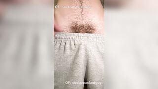 Taunting you in my grey sweatpants and chasity, showcasing off the soles and the ass-pipe in my fuck hole