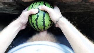 The fellow humps watermelon stiff with a giant unshaved salami