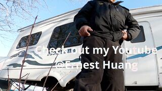 Messy dude urinating outside and packing a jar with scorching yellow pee