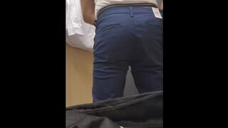 in a fitting bedroom in a shop