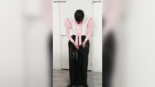 Putting on another lengthy spandex micro-skirt over microskirt, half-shirt, protection pantyhose and underpants, layers