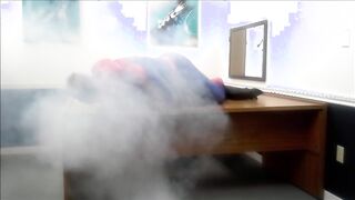 spiderman ravages robber he finds in an office