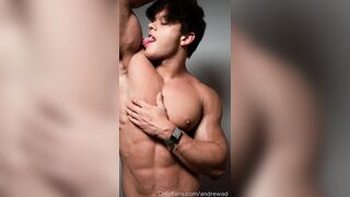 Sport model tonguing his own biceps