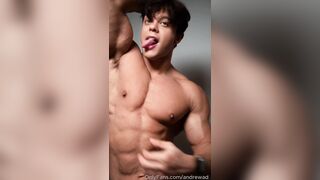 Sport model tonguing his own biceps
