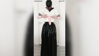 Putting on spandex student uniform t-shirt over love glove microskirt, half-top, spandex layers