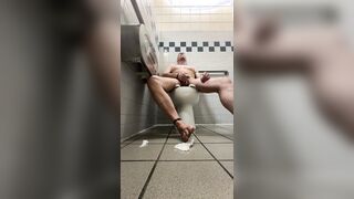 Jerking off in a public rest room while others come and go