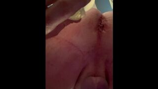 Sleek plump sissy butt-plugs her crevice while encaged.