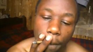 AFRICA LAD SMOKING WEED AND GETTING HIGH