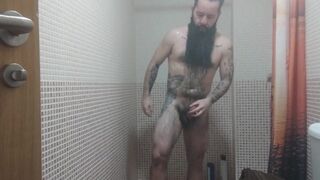 Solo masculine. Bearded & tatted otter in the bathroom