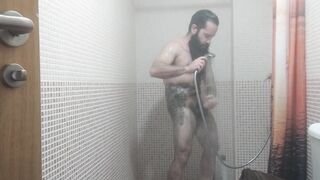 Solo masculine. Bearded & tatted otter in the bathroom