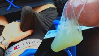 The boy crammed the rubber to the top with nut nectar while sitting in the truck