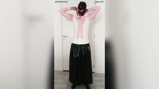 Putting on pinkish frilly spandex half-shirt over lengthy protection micro-skirt, maid pantyhose, undies, layers