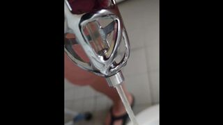 Urinate in the manstick box with catheter in pantyhose