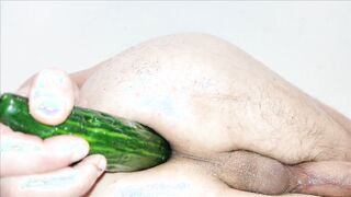 Close up cucumber injection with rubdown lube and precum as oil