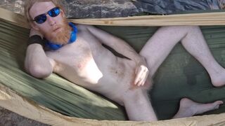 Naturist loses his clothes and finishes off for you in a hammock