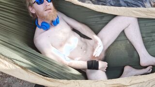 Naturist loses his clothes and finishes off for you in a hammock