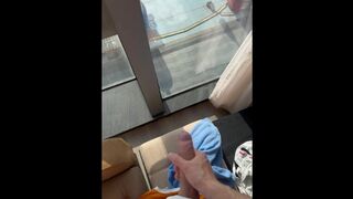 Tugging off from motel window