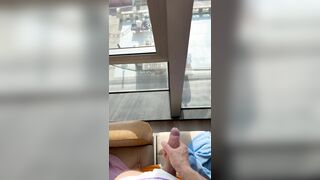 Tugging off from motel window