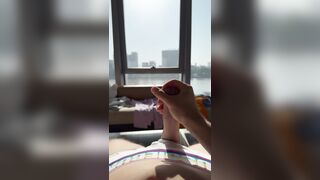 Tugging off from motel window