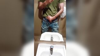 heterosexual dude in blue denim drains off in public wc